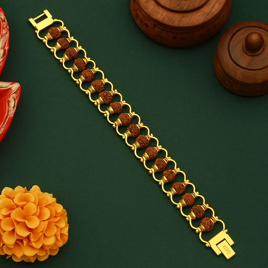 Gold bracelet with brown beads on a green background