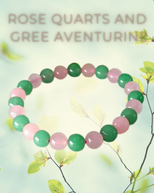 Bracelet with green and pink beads on a light background with leaves